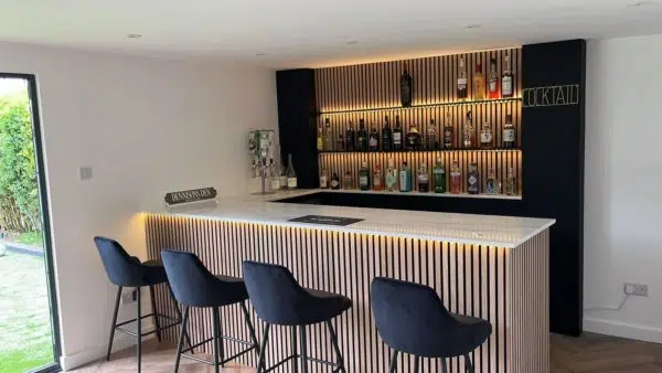 Acoustic slat wall panelling cocktail bar