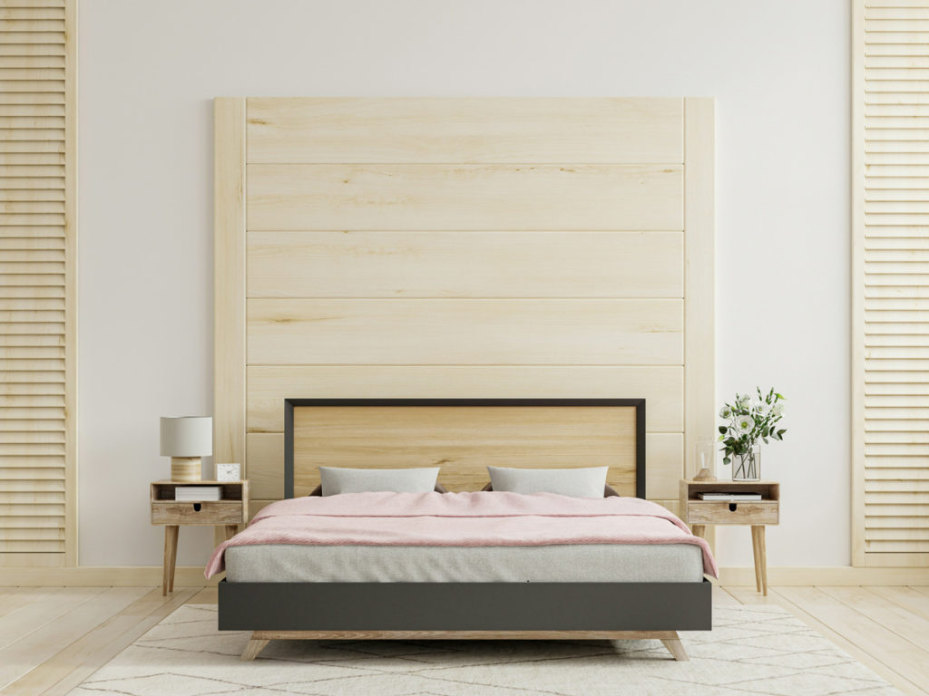 Bed with panelled headboard